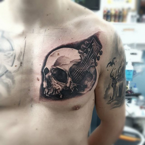 tattoo skull and guitar.png